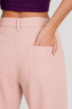 Women wearing pink wide leg stretch jeans