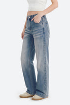 Women wearing retro blue wide leg stretch jeans