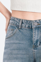 Women wearing retro blue wide leg stretch jeans