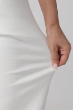 Women wearing white wide leg stretch jeans