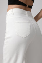 Women wearing white wide leg stretch jeans